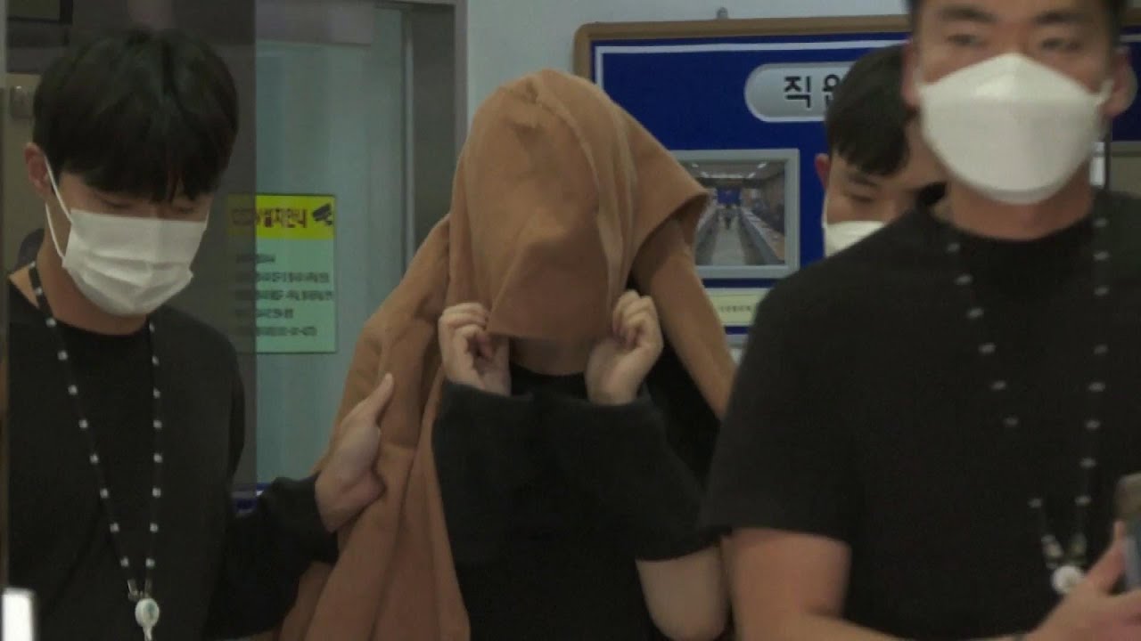 Mother Arrested After 2 Children Found Dead in Suitcases