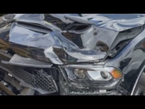4 people hurt when stolen SUV crashes into bus carrying children's choir