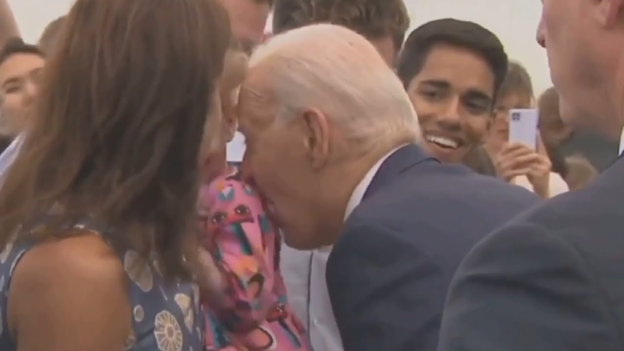 ‘Stop eating the children’: Joe Biden caught ‘nibbling’ on child’s shoulder